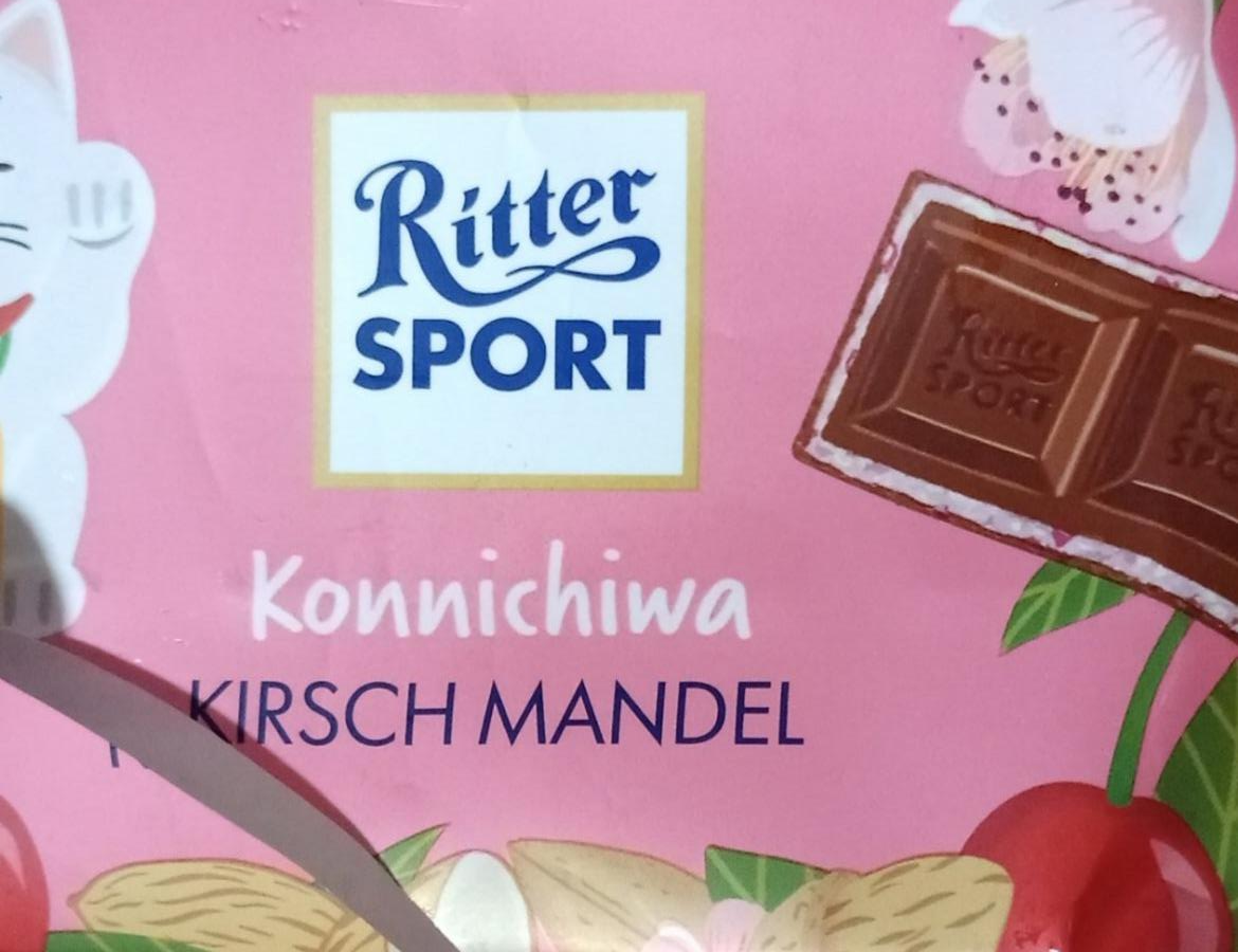 Фото - Шоколад молочний з начинкою Вишня і Мигдаль Ritter Sport