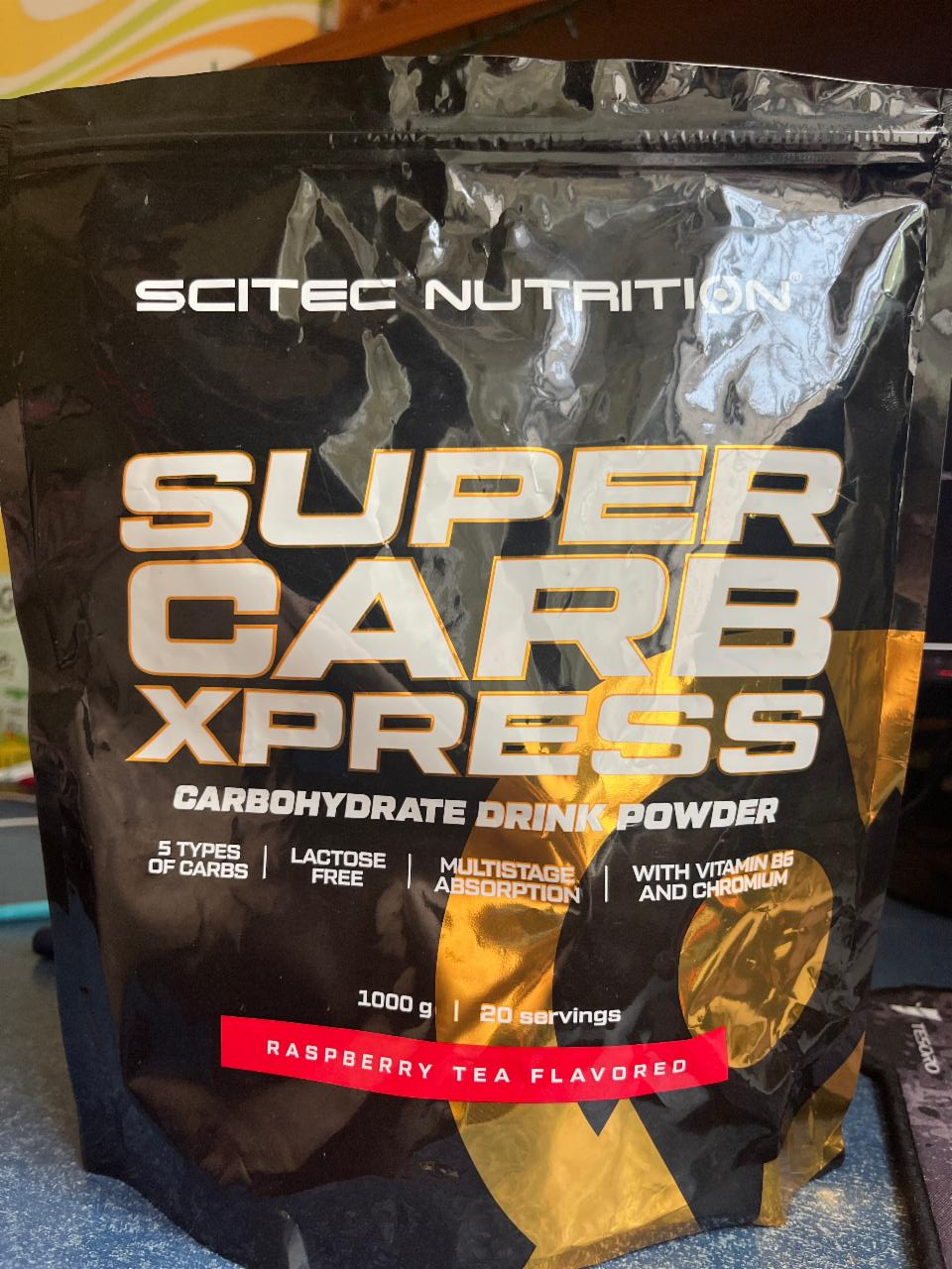 Фото - Super Carb Xpress rasberry tea flavored Scitec Nutrition