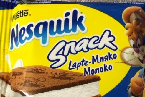 Фото - Бісквітне тістечко з молочною начинкою Snack Lapte Мляко молоко Nesguik Nestle