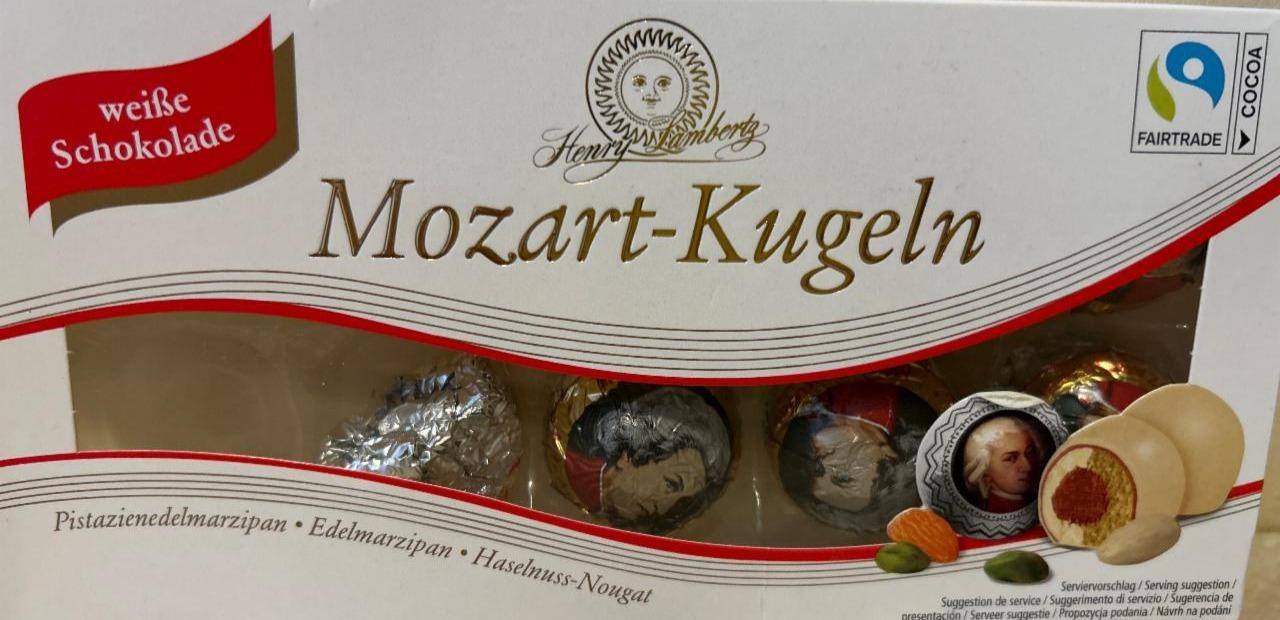 Фото - Цукерки в білому та молочному шоколаді Mozart-Kugeln Henry Lambertz