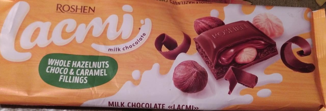 Фото - Молочний шокола Lacmi з цілими лісовими горіхами, карамельною та шоколадною начинкою Roshen