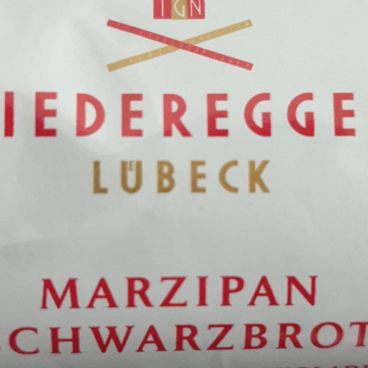 Фото - марципановий батончик у чорному шоколаді Lübeck Marzipan Schwarzbrot Niederegger