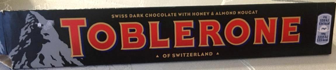Фото - Шоколад швейцарський чорний з медово-мигдальною нугою Toblerone
