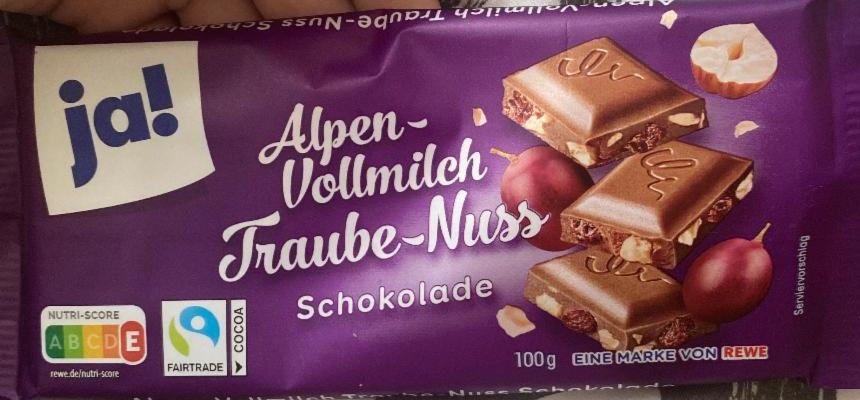 Фото - Шоколад молочний альпійський з родзинками і горіхами Ja!