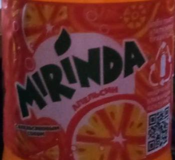 Фото - Напій безалкогольний сильногазований зі смаком чорниці та апельсину Mix-it Mirinda
