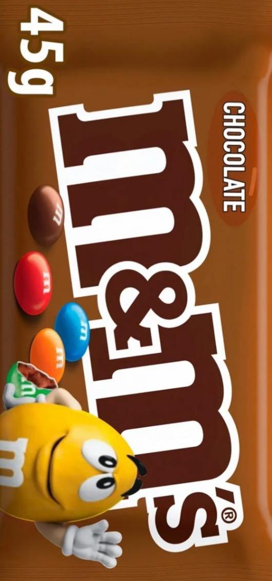 Фото - Драже з молочним шоколадом вкриті різнокольоровою цукровою глазур'ю M&M`s