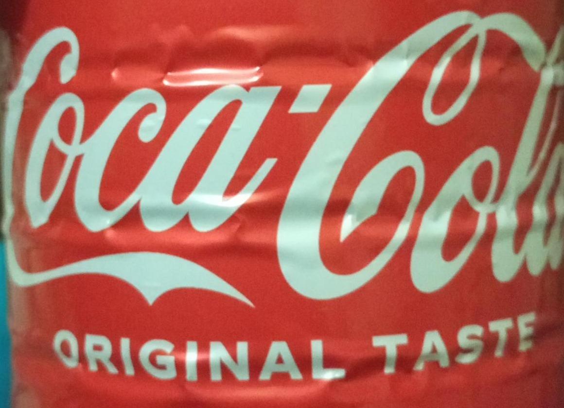 Фото - Напій безалкогольний сильногазований Coca-Cola