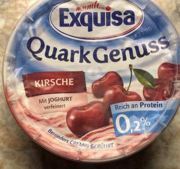 Фото - Сирковий десерт 0.2% з йогуртом і вишневим наповнювачем Quark-Genuss Exquisa