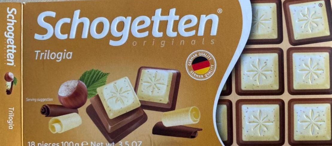 Фото - Шоколад білий 30%Trilogia з горіхом на молочному шоколаді 34% та шоколаді Gianduja 33% Schogetten
