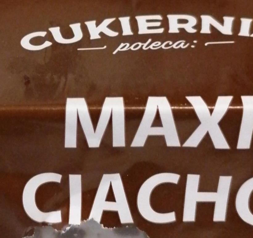 Фото - Ciasto biszkoptowo-tłuszczowe o smaku kakaowym przełożone kremem o smaku śmietankowym Cukiernia Kazana