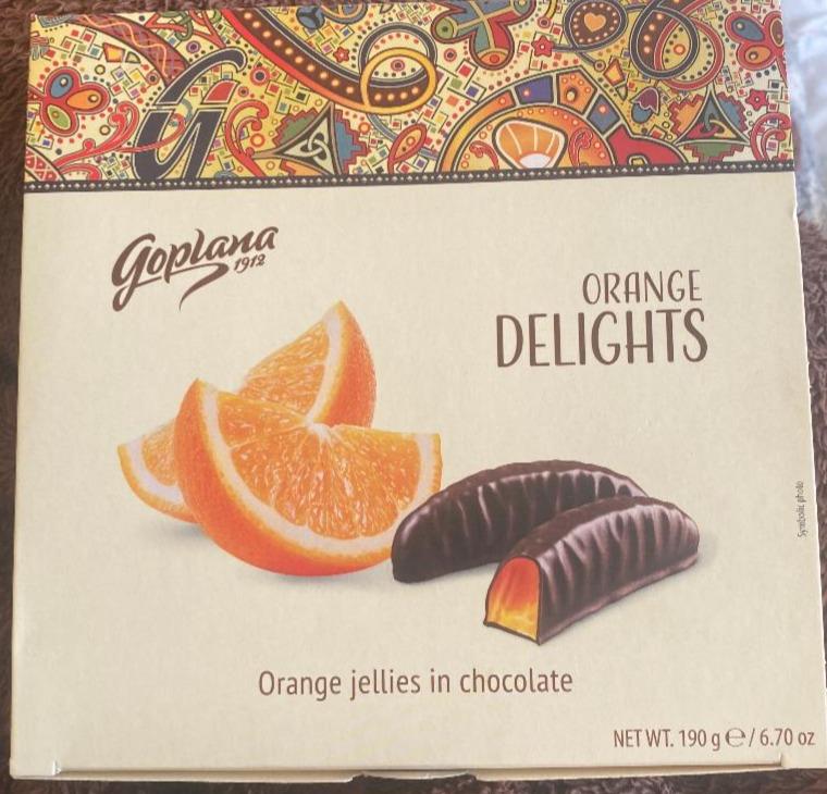 Фото - цукерки Желе зі смаком апельсину покриті шоколадною глазур'ю Orange Delights Goplana