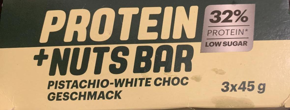 Фото - Батончик протеїновий Pistachio-White Choc High Protein Bar Protein & Nut IronMaxx