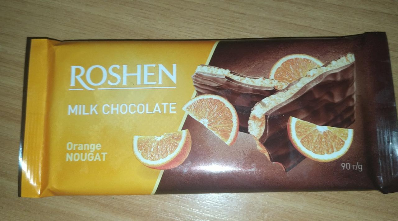Фото - шоколад молочний з апельсиновою нугою Roshen
