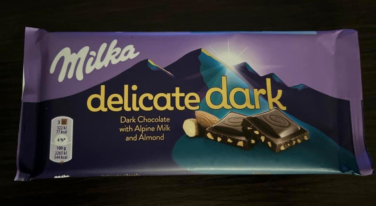 Фото - Шоколад чорний з альпійським молоком і шматочками мигдалю Delicate Dark Almond Milka