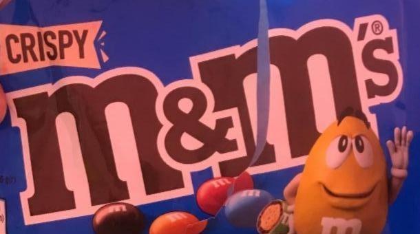 Фото - Драже M&M's Crispy з рисовими кульками у молочному шоколаді вкрите цукровою різнокольоровою глазур'ю M&M's