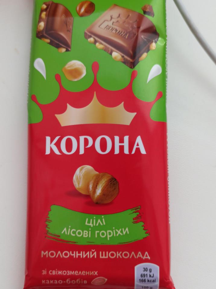Фото - Шоколад молочний з цілими лісовими горіхами Корона