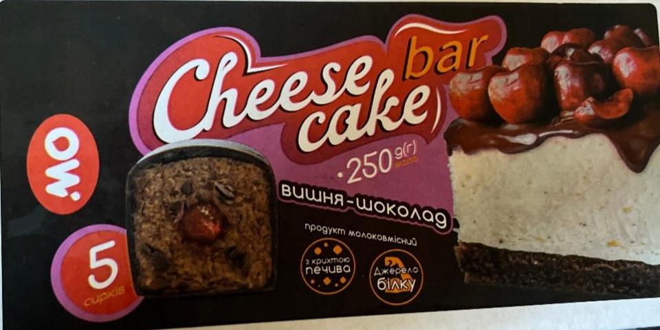 Фото - Сирок молоковмісний глазурований з цукром та печивом Cheese cake bar шоколад-вишня Молочний острів