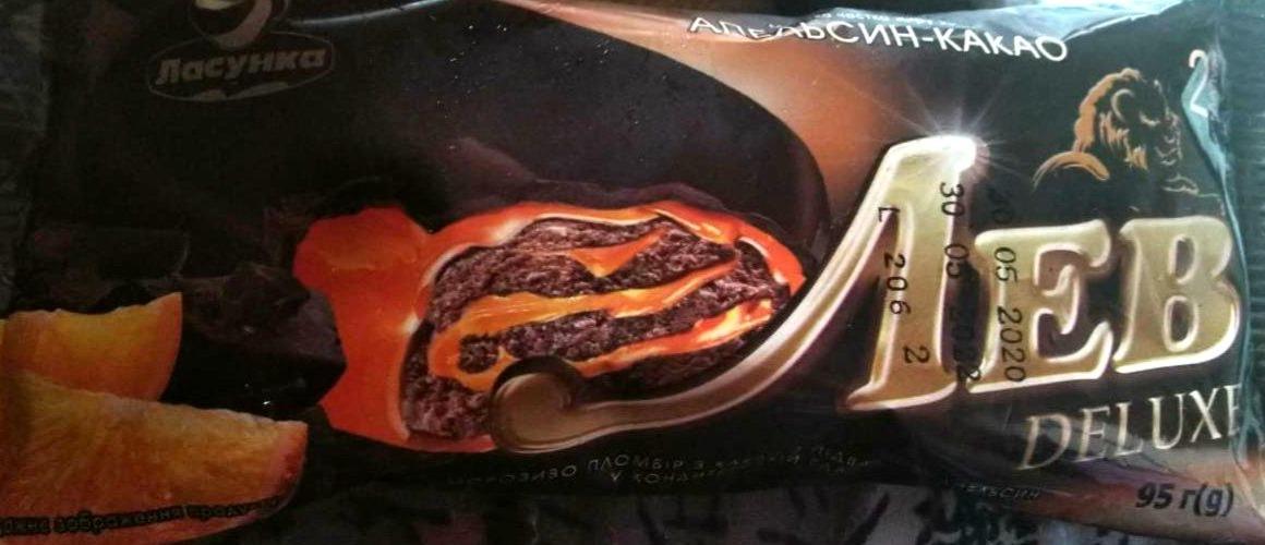 Фото - Морозиво пломбір з какао Лев Deluxe з підваркою Апельсин у кондитерській глазурі Ласунка