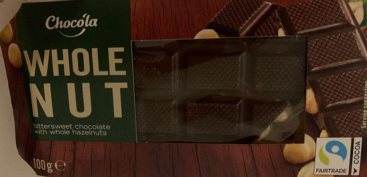 Фото - Чорний шоколад з обсмаженими цілими ядрами лісових горіхів 27% Вміст сухого какао в темному шоколаді становить не менше 50%. Ludwig Schokolade