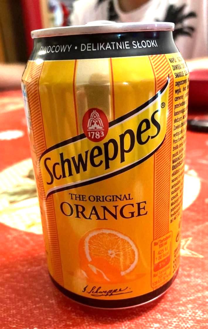 Фото - Напій безалкогольний газований з апельсиновим смаком Orange Schweppes