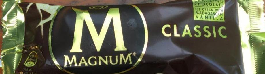 Фото - Морозиво 13% ескімо Magnum Classic з мадагаскарською ваніллю в шоколадній молочній глазурі Classic Magnum