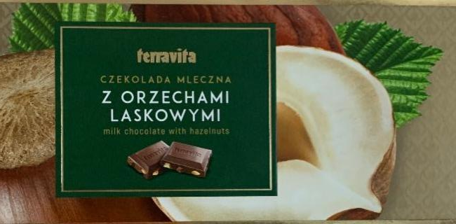 Фото - Шоколад молочний з половинками лісових горіхіів Terravita