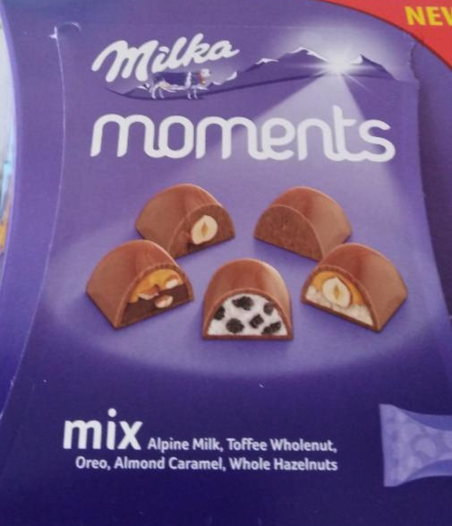 Фото - Цукерки в молочному шоколаді Moments Zarte Mix Milka