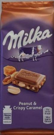Фото - Шоколад молочний з арахісом, шматочками хрумкої карамелі, рисовими кульками та кукурудзяними пластівцями Milka (Мілка)