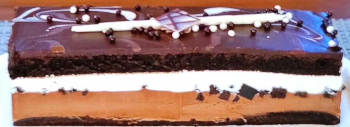 Фото - Chocolate Mousse Tuxedo Cake Costco