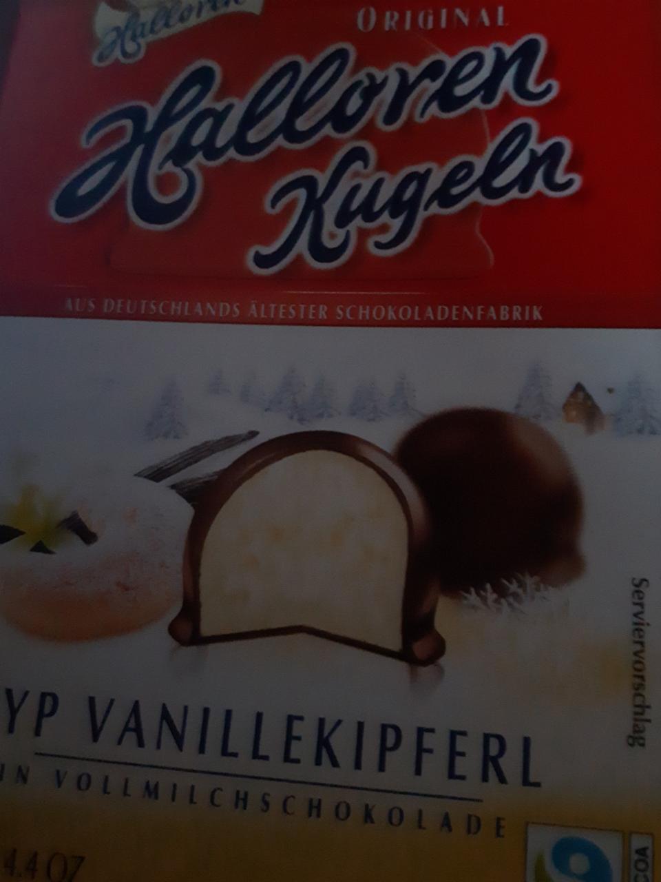 Фото - Десерт Halloren Kugeln з ванільною начинкою та шматочками бісквіта глазурований молочним шоколадом Halloren