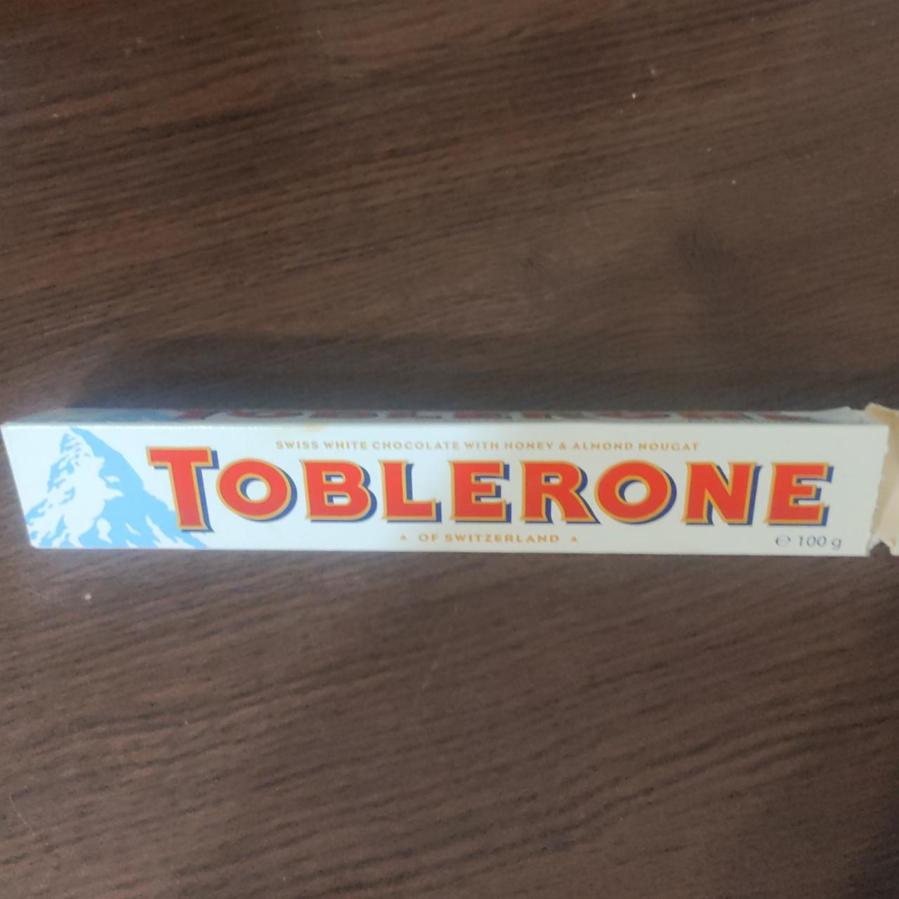 Фото - Шоколад білий з медово-мигдального нугою Toblerone