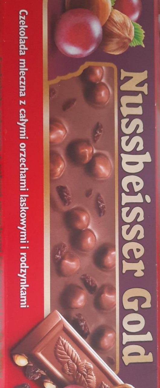 Фото - Шоколад молочний Nussbeisser Gold з цілим лісовим горіхом та родзинками Mondeléz